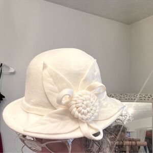 Elegant Beige Cloche Hat with Floral Accent